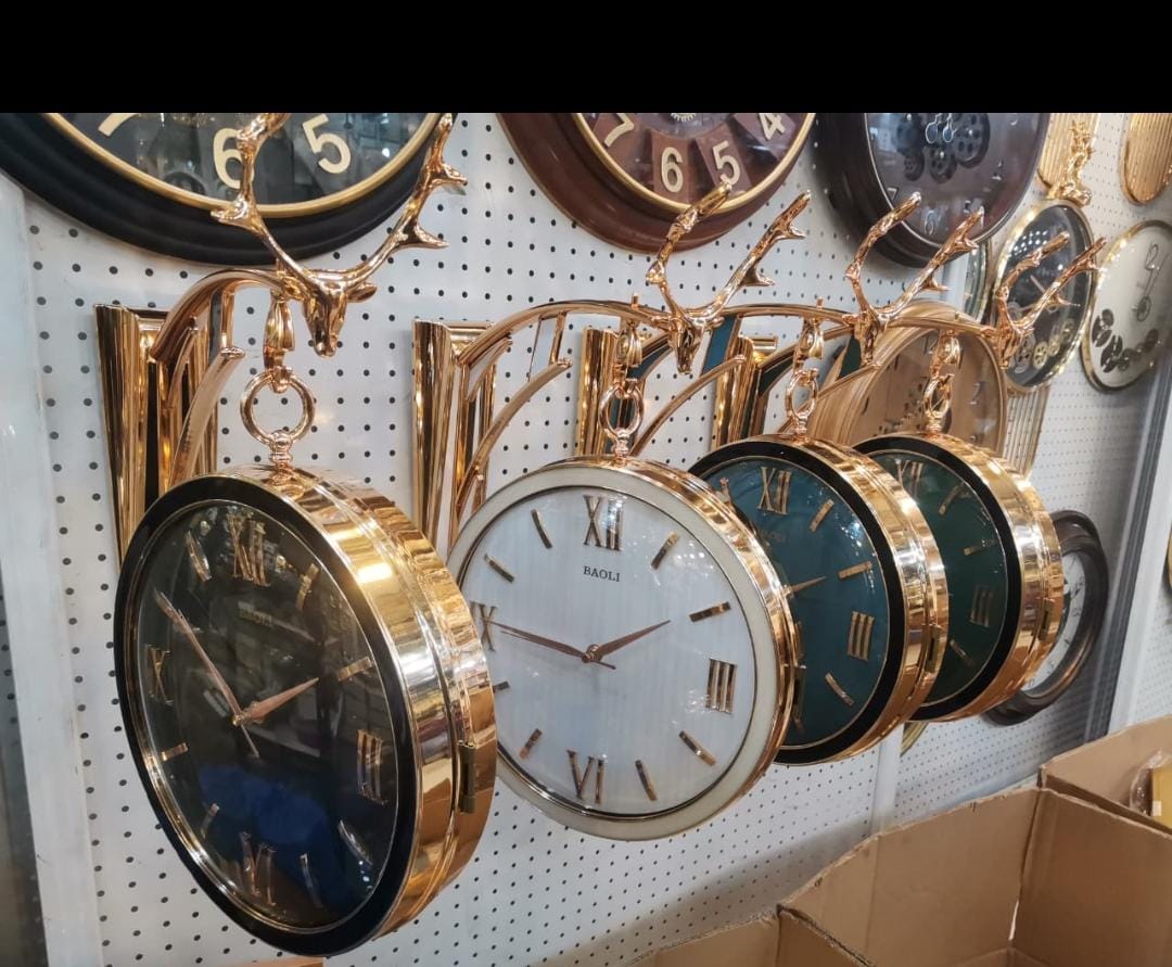 Double sided wall clock