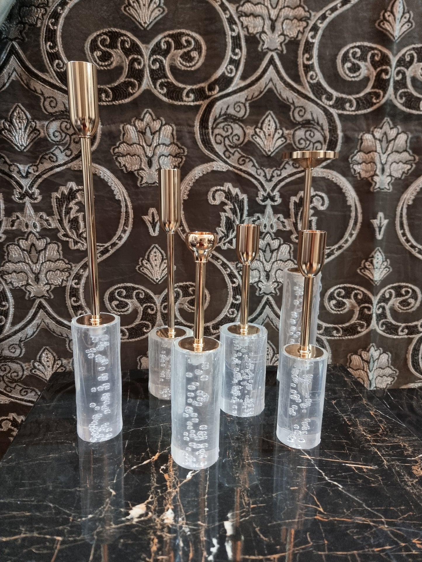 Acrylic and metal candle holders