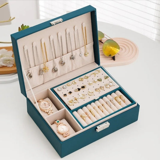 Multi-layered jewelry box designed for organizing various types of jewelry and accessories.